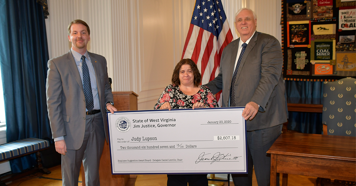 Gov. Justice, Del. Daniel Linville award checks to public employees for